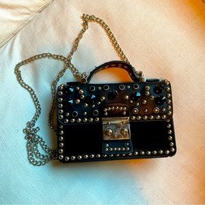 Black crossbody mini bag with studded detail